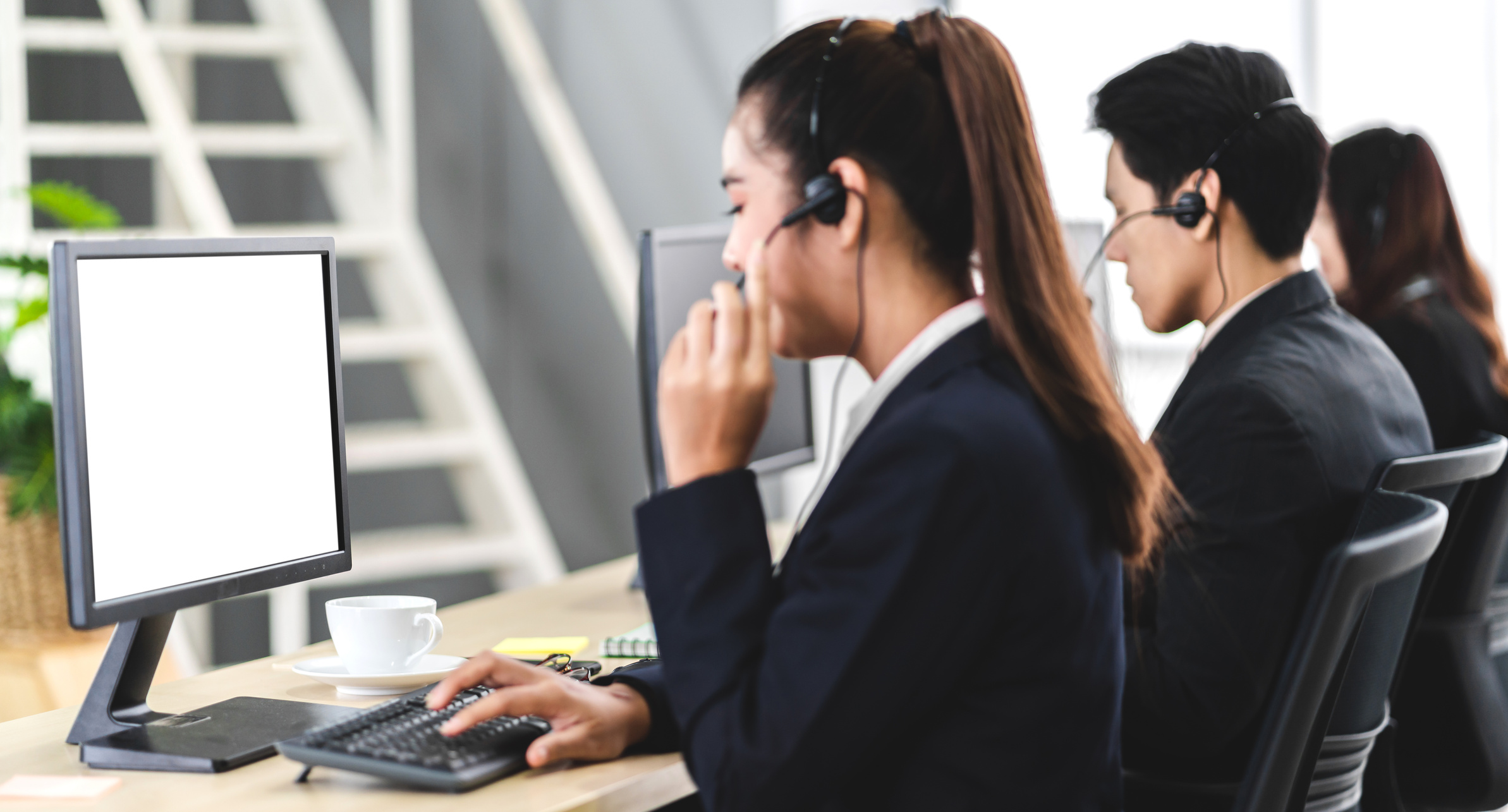 Beautiful Businesswoman Customer Support Services Working with H